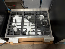 Load image into Gallery viewer, Café 36 inch gas rangetop, top view on pallet