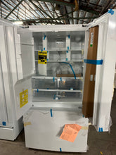 Load image into Gallery viewer, Refrigerator interior with doors open